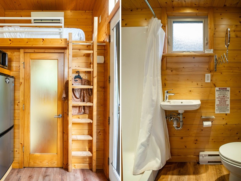 Three coat hooks were on the wall behind the ladder up to the cot.In the bathroom, there was a standing shower on the left, a toilet and storage space on the right, and a small sink in the middle. There was also a hanging mirror that pulled out from the wall to save space when not in use.I found Beekman 1802 shampoo, conditioner, and body wash in the shower.