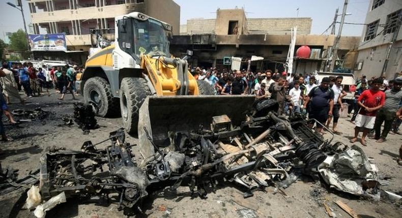 Three bombings in Baghdad kill 63 -police, medical sources