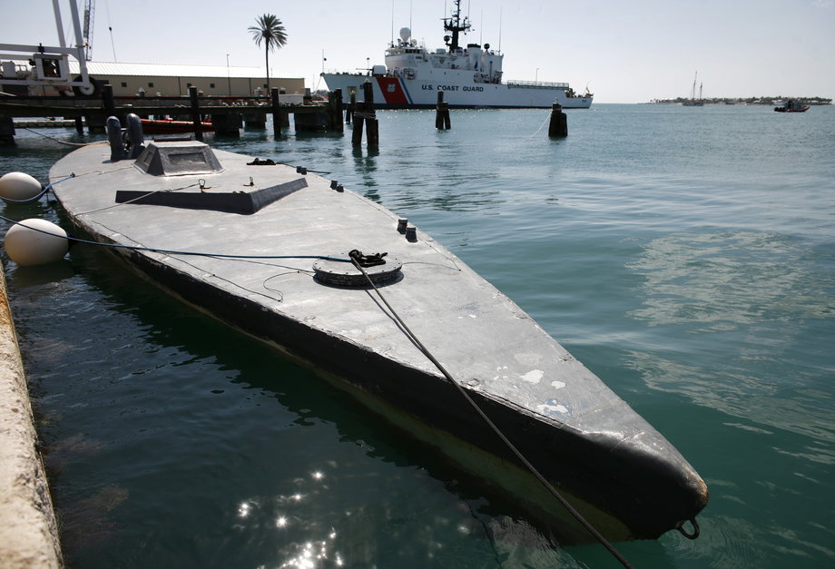 A semi-submersible vessel that was caught in the Pacific Ocean with about seven tons of cocaine last September, is docked at the US Coast Guard base in Key West, Florida February 17, 2009. Known as "coffins," the sleek jungle-built submarines are steaming their way north from Colombia through Pacific waters to deliver tonnes of illegal drugs headed for the U.S. Market. Picture taken February 17, 2009.