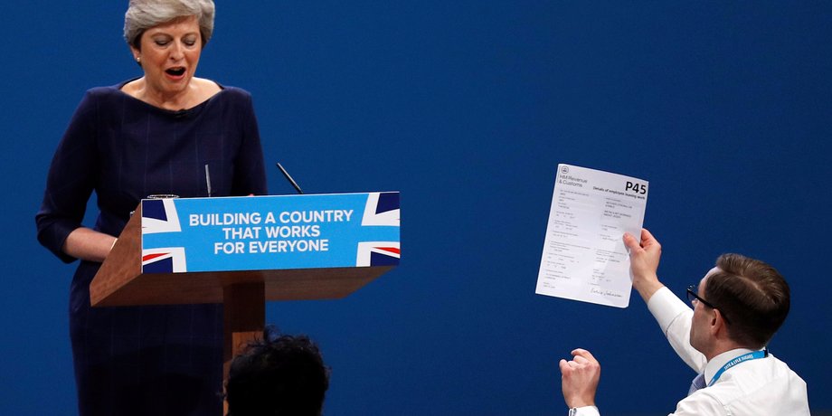 Prime Minister Theresa May interrupted by a protestor during her Conservative conference speech.