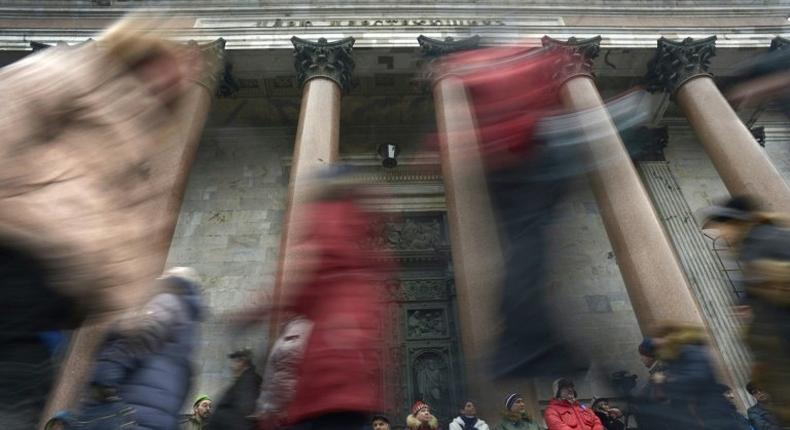 People take part in a rally in front of the St Isaac's Cathedral in Saint Petersburg, Russia on February 12, 2017 to protest against the city authorities' decision to hand control of the building to the powerful Russian Orthodox Church