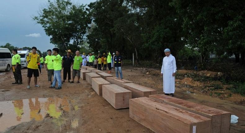 The human trafficking crisis emerged after Thai officials uncovered dozens of shallow graves in hidden camps dotting the steep hills along the Thai and Malaysian border area