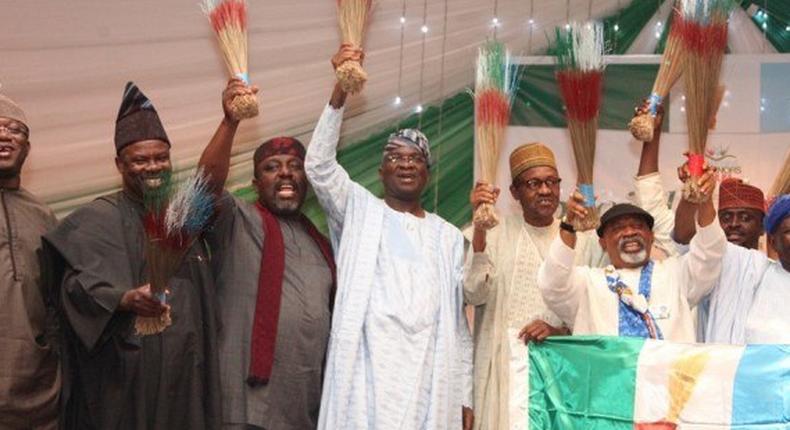 Former Lagos State Governor, Babatunde Fashola SAN (middle) with his  Ekiti, Ogun, and Imo, States counterparts, Dr. Kayode Fayemi (left), Senator Ibikunle Amosun (2nd left) Owelle Rochas Okorocha (3rd left) respectively and former Head of State, General Muhammadu Buhari GCFR (3rd right), National Chairman, All Progressives Congress (APC),  Chief Bisi Akande (right) presenting Dr. Chris Ngige (2nd right) as the party flag bearer in Abuja, on Wednesday, November 6, 2013.