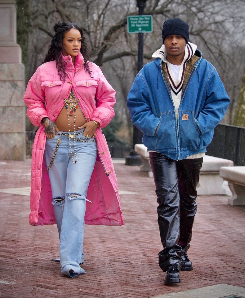 Rihanna together with boyfriend A$AP Rocky strolling in New York during pregnancy announcement photoshoot in January 2022. She wore a stylish quilted Chanel coat 
