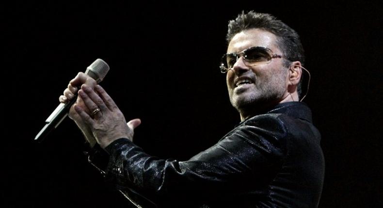 British pop star George Michael, whose publicist said December 25, 2016 had died, performs on stage at the Palau Sant Jordi in Barcelona 23 September 2006