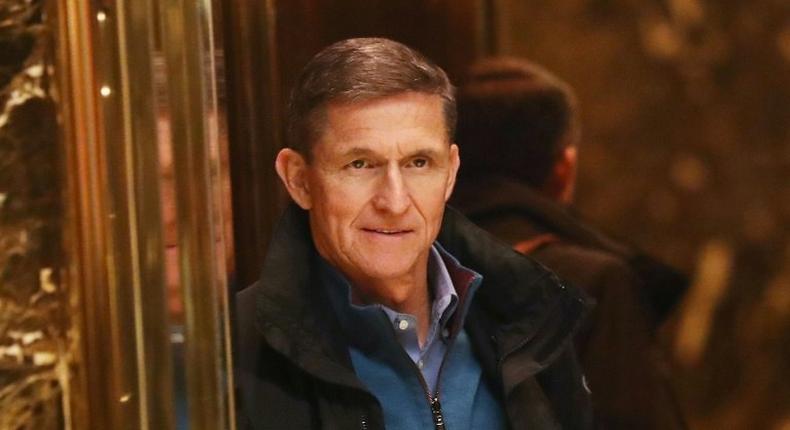 General Mike Flynn, pictured at Trump Tower in November, resigned as US national security advisor over his contacts with the Russian envoy to Washington