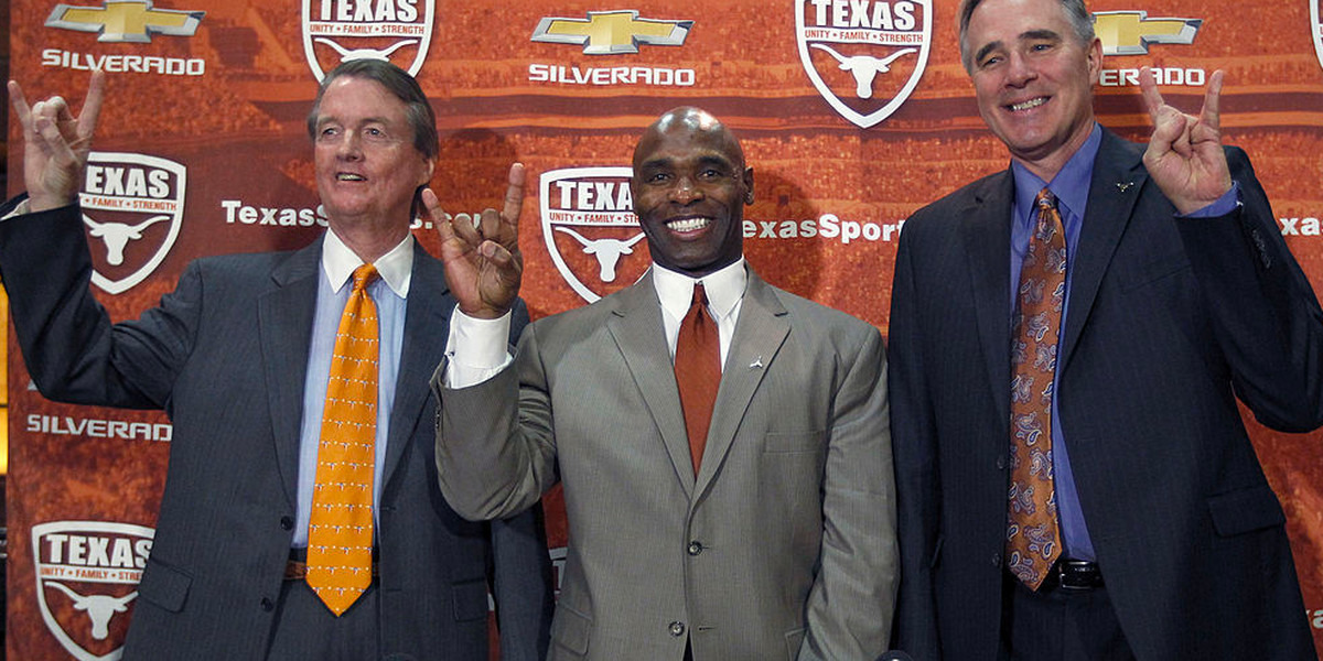 Charlie Strong introduced as Texas coach in 2014 with school president Bill Powers, left and athletic director Steve Patterson, right.