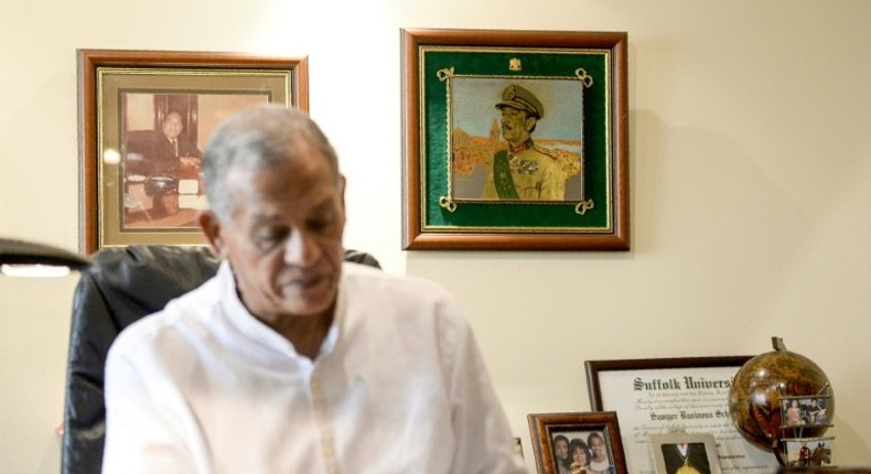 Mohammed Sadat proudly keeps a photo of his late uncle in his Cairo office