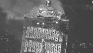 This black-and-white image released by the US military's Central Command shows the fire aboard the bulk carrier True Confidence after a missile attack by Yemen's Houthi rebels in the Gulf of Aden on March 6, 2024.US Central Command via AP
