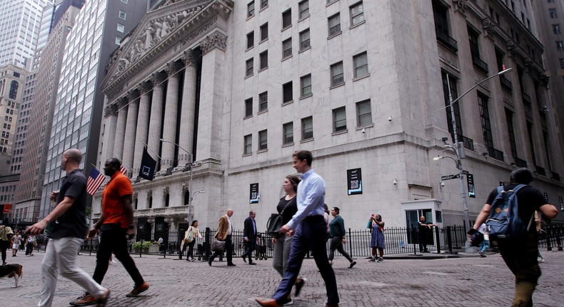 People walk near the New York Stock Exchange.Leonardo Munoz/VIEWpress via Getty Images