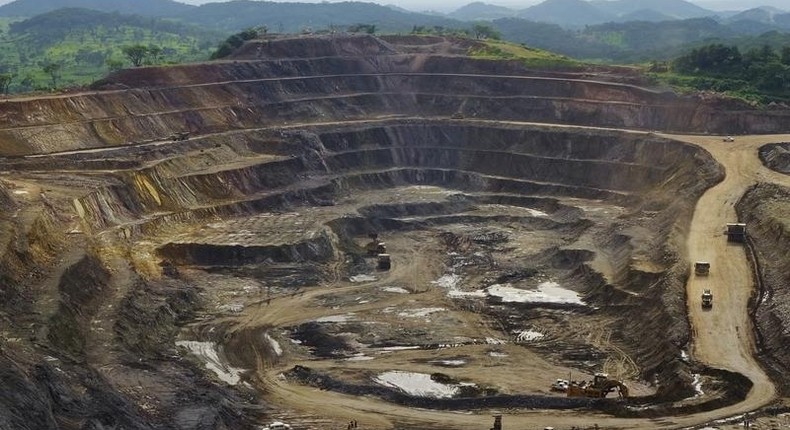 Excavators and drillers at work in an open pit at Tenke Fungurume, a copper and cobalt mine 110 km (68 miles) northwest of Lubumbashi in Congo's copper-producing south, owned by miner Freeport McMoRan, Lundin Mining and state mining company Gecamines, in a file photo. REUTERS/Jonny Hogg