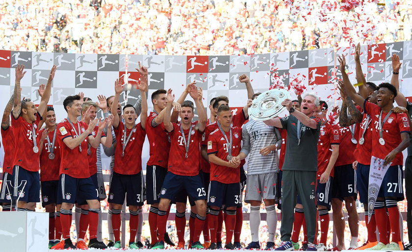 Bayern Munich celebrate winning the Bundesliga trophy at the Nockherberg beer garden in Munich