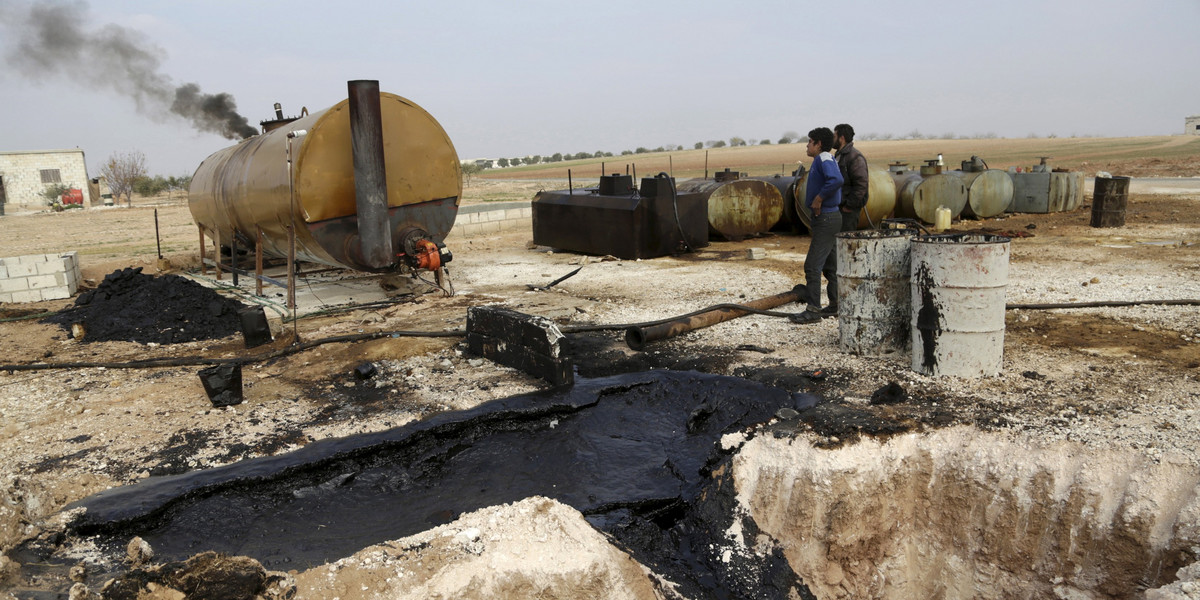 A makeshift oil-refinery site in Marchmarin town, southern countryside of Idlib, Syria, December 16, 2015.
