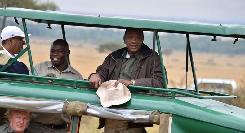 File image of former President Uhuru Kenyatta during a past game drive at Maasai Mara Game Reserve, [courtesy of Nation].