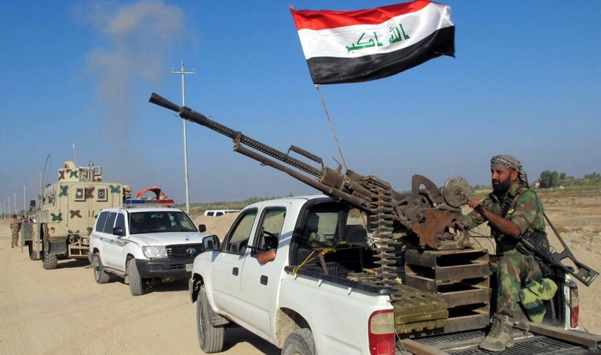 Pripadnici grupe Kataib Hezbolah u Džurf al Saharu na jugu Iraka 27. oktobra 2014.