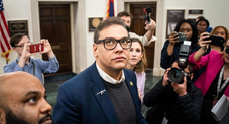 Reporters surround Rep. George Santos at the US Capitol on January 31, 2023 in Washington, DC.Kent Nishimura / Los Angeles Times via Getty Images