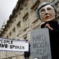 Protestor wearing a Theresa May mask is seen the day after Britain's election in London