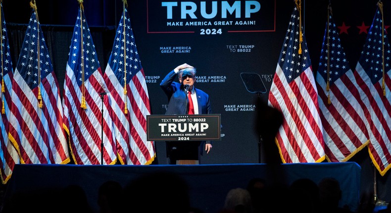 Former US President Donald Trump searches the crowd while speaking during an event at the Adler Theatre on Monday, March 13, 2023, in Davenport, Iowa.Jabin Botsford/The Washington Post via Getty Images