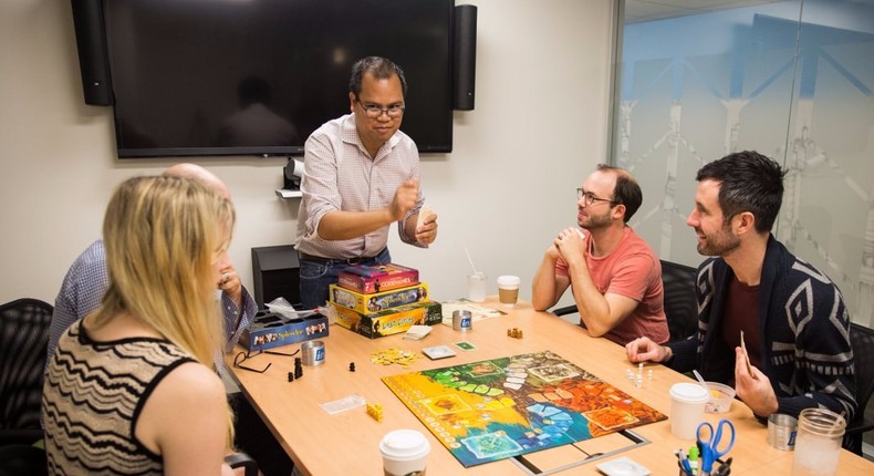 LinkedIn employees sit down for a board game during InDay — a monthly event that offers LinkedIn employees the chance to participate in different activities and team-building exercises.