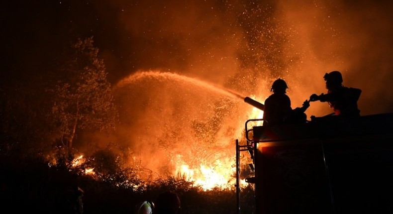 Firefighters near Gois in central Portugal, where even locals who are no strangers to forest fires say they have never seen such a devastating blaze