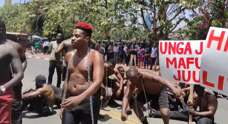 Eric Omondi leads protests outside parliament buildings