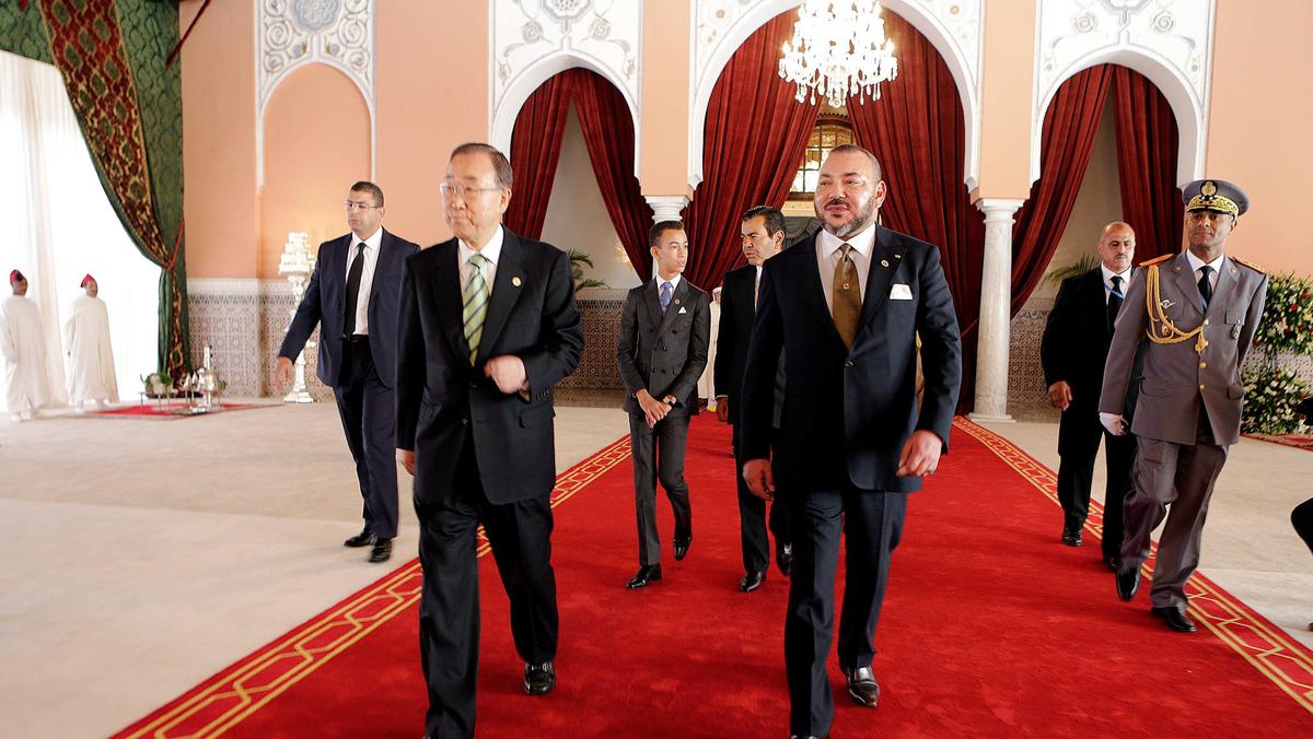 King Mohammed VI of Morocco and UN Secretary-General Ban Ki-moon walk at the Royal Palace during the UN Climate Change Conference 2016 in Marrakech