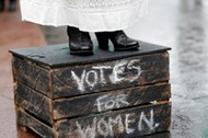 Councillor Elaine Pantling, dressed as suffragette Alice Hawkins, speaks during an event to mark 100 years of votes for women in Leicester