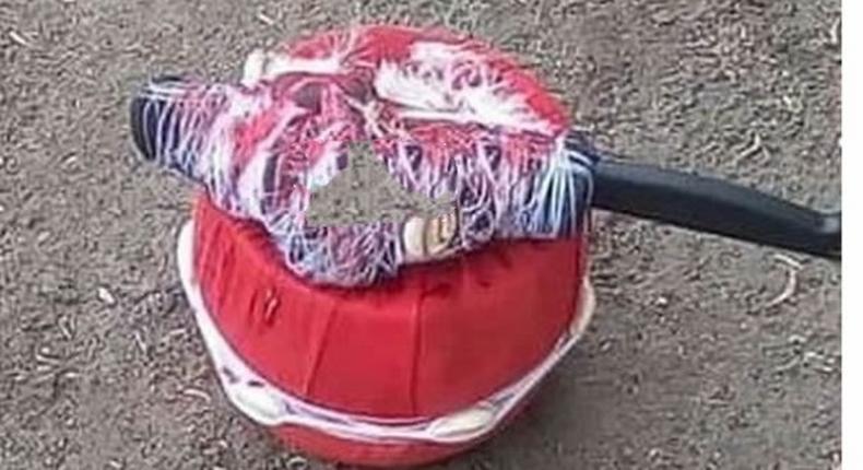 Ghanaian man in fear after finding a pot covered with red cloth & knife in his shop