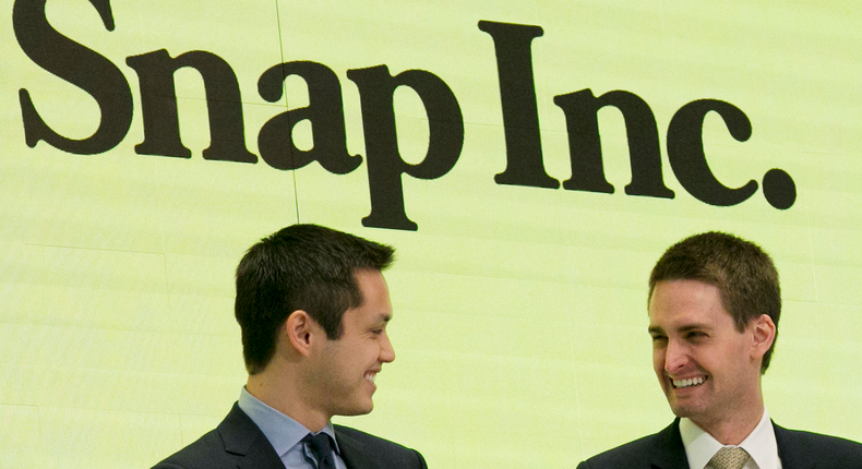 Snapchat co-founders Bobby Murphy, left, and CEO Evan Spiegel ring the opening bell at the New York Stock Exchange as the company celebrates its IPO, Thursday, March 2, 2017