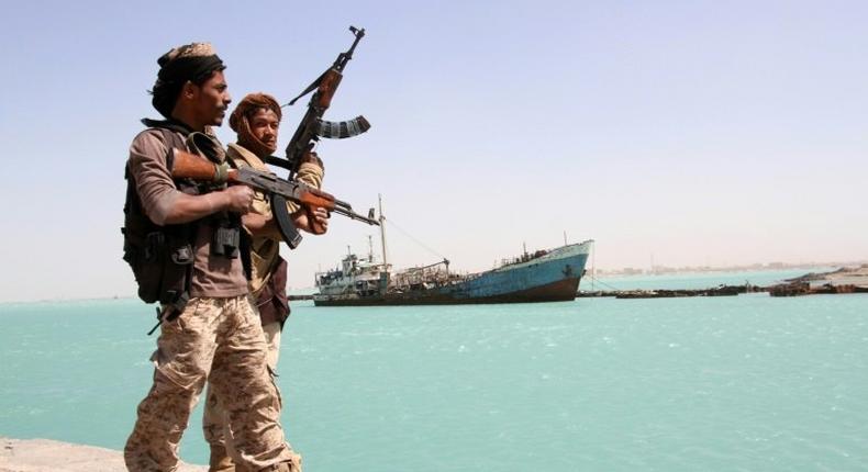 Yemeni pro-regime forces patrol the port of Mokha, on February 9, 2017