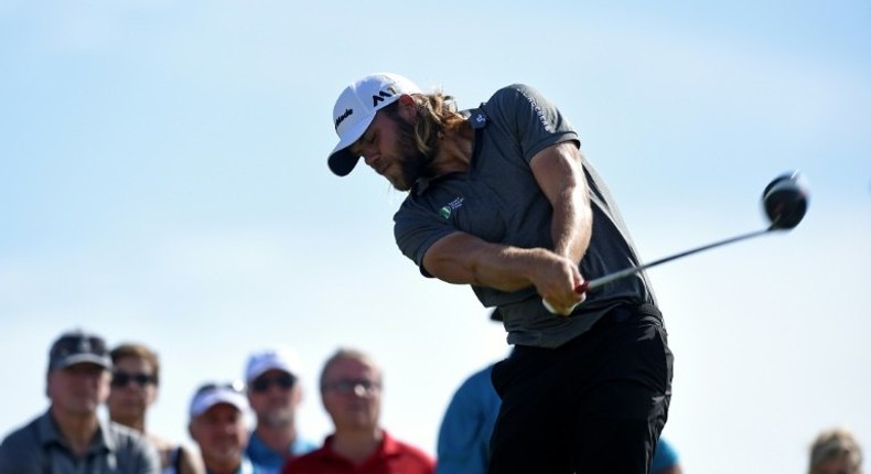 Swedish golfer Johan Carlsson plays a shot from Tee 17 during the first round of Portugal Master golf tounament at Oceanico golf course in Vilamoura on October 20, 2016