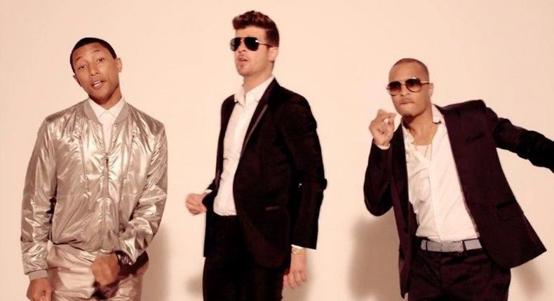 Pharell Williams, Robin Thicke and T.I as shown in 'Blurred Lines' video