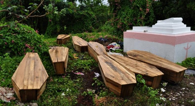 Caskets of victims of violence in in Kingston's May Pen Cemetery in 2010