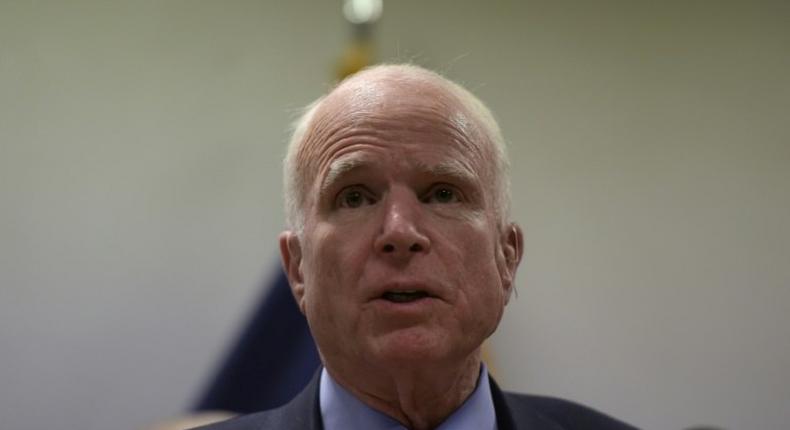 US Senator John McCain, shown here in Kabul in early July, is recovering from surgery to remove a blood clot from his head