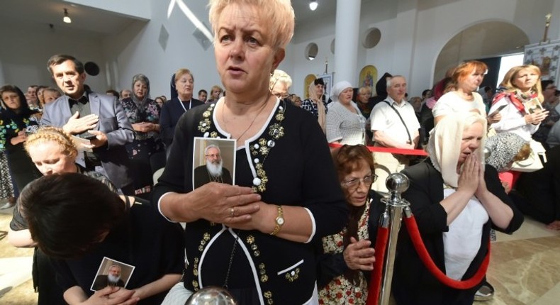 Believers attend a funeral ceremony for Lubomyr Husar, ex-head of Ukrainian Greek Catholic Church, on June 5, 2017, in Kiev