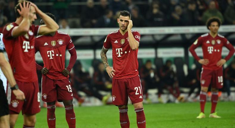 France defender Lucas Hernandez (C) and his Bayern Munich team-mates look shell-shocked after losing at Moenchengladbach on Wednesday Creator: Ina Fassbender