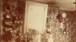 Sypialnia, pokój i kuchnia czyli małe trzy w jednym. Zdjęcie z 1910 roku.