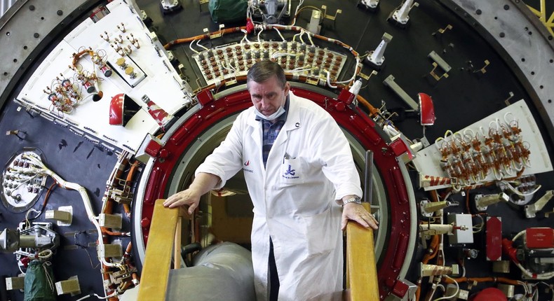 A specialist at the Khrunichev State Research and Production Space Center works on preparations of the Nauka module, July 31, 2020.
