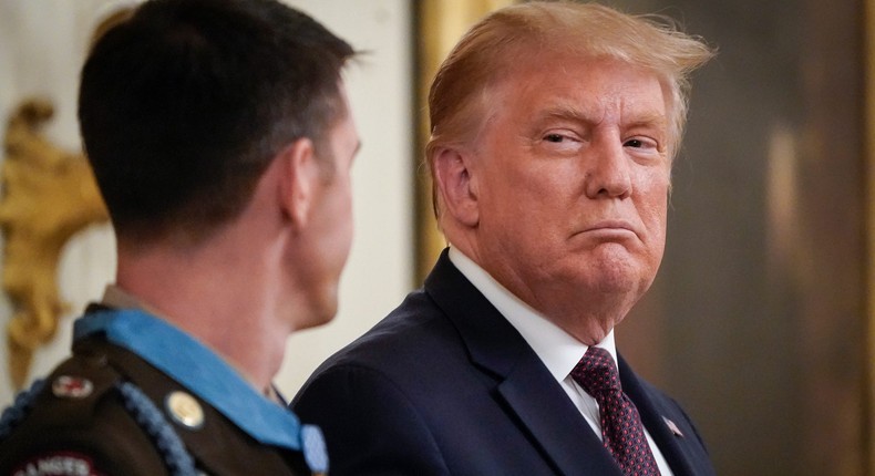 U.S. President Donald Trump looks on after presenting the Medal of Honor to Sergeant Major Thomas P. Payne, United States Army, for conspicuous gallantry in the East Room of the White HouseDrew Angerer/Getty Images