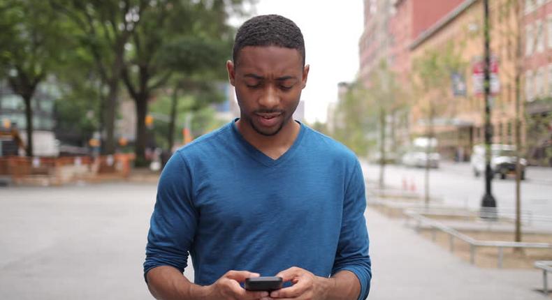 Man texting (Shutterstock)