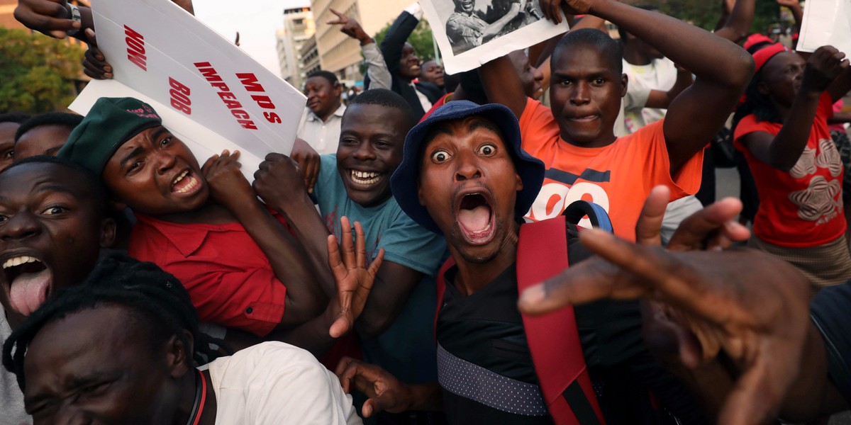 Zimbabwean's celebrate Mugabe's resignation.