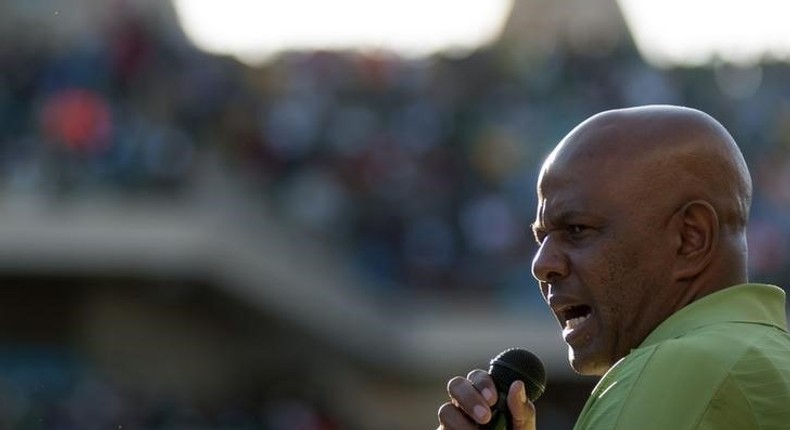 The Association of Mineworkers and Construction Union (AMCU) President Joseph Mathunjwa speaks to striking mine workers at the Royal Bafokeng Stadium in Rustenburg, June 23, 2014. REUTERS/Skyler Reid