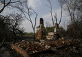 The remains of a burnt house are seen in the village of Lubyanka in Chernobyl area, northern Ukraine