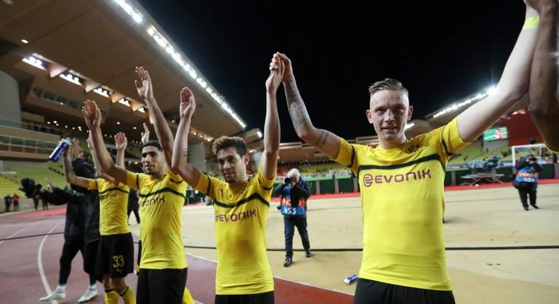 Borussia Dortmund celebrate Tuesday's 2-0 win at Monaco, which confirmed their Champions League, last 16 place as group winners, but coach Lucien Favre is expected to make numerous changes on Saturday for the Bundesliga leaders against Werder Bremen.