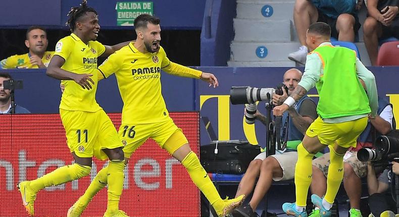 Samuel Chukwueze celebrates with Alex Baena, Villarreal’s sole scorer against Sevilla