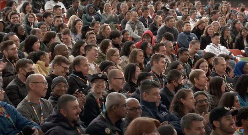 The crowd at Google IO's keynote reacts with cheers and applause at the remark aimed at Apple.Google