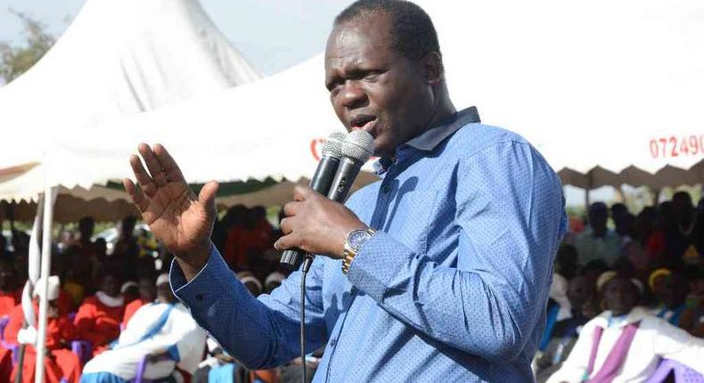 Jubilee Party Secretary General Raphael Tuju addressing mourners at a funeral earlier. He has warned Luo intellects against Raila Odinga.