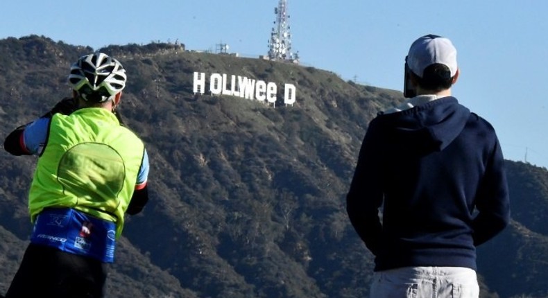 The famous Hollywood sign reads Hollyweed after it was vandalized, January 1, 2017