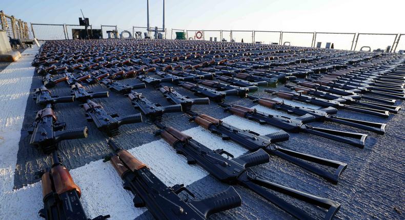Thousands of AK-47 assault rifles sit on the flight deck of guided-missile destroyer USS The Sullivans (DDG 68) during an inventory process, Jan. 7. U.S. naval forces seized 2,116 AK-47 assault rifles from a fishing vessel transiting along a maritime route from Iran to Yemen.US Navy photo