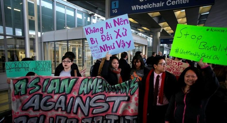 Demonstrators protest against United Airlines at O'Hare International Airport on April 11, 2017 in Chicago